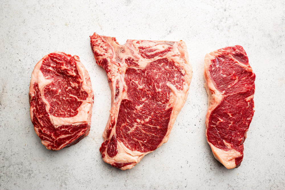 New York Strip vs Ribeye: A Steak Lover's Dilemma